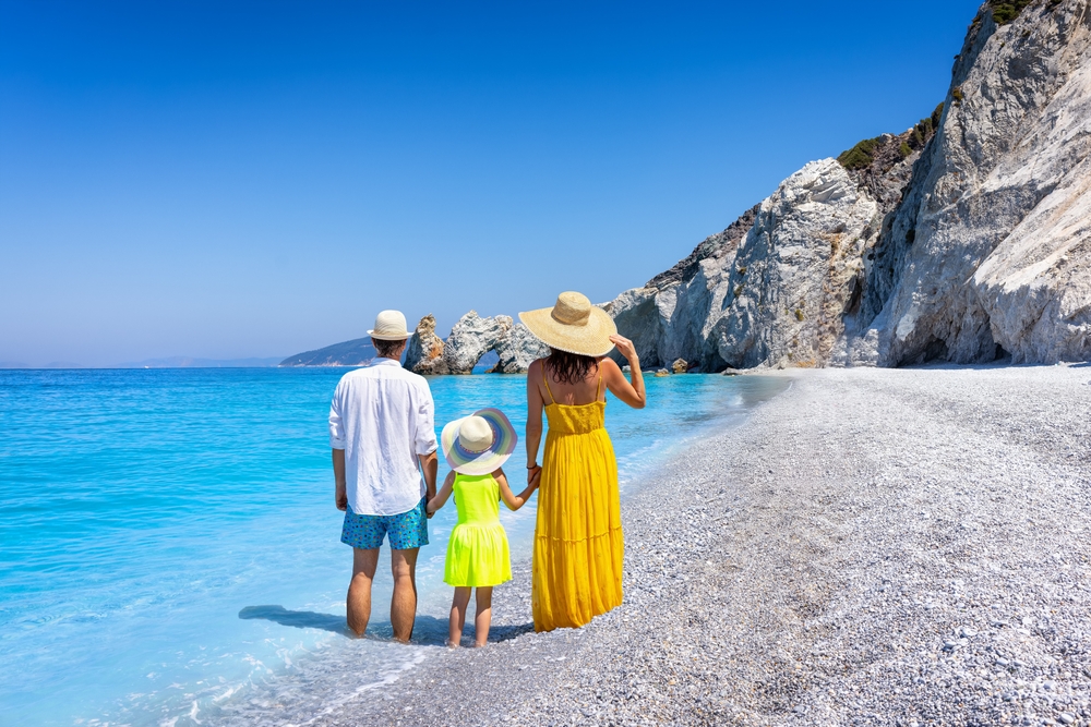 A,Tourist,Family,Enjoys,The,Beautiful,Beach,Of,Lalaria,,Skiathos